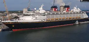 Disney cruise ship docked at harbor