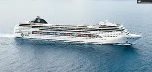 MSC Lirica cruise ship sailing in calm waters with scenic mountains in the background.