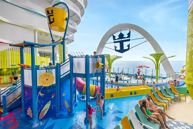 Kids playing at Splashaway Bay and Water's Edge Pool at Surfside Neighborhood on Icon of the Seas, wide view, aquapark, water park