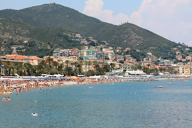 Varazze beach Italy mountain and beach with people